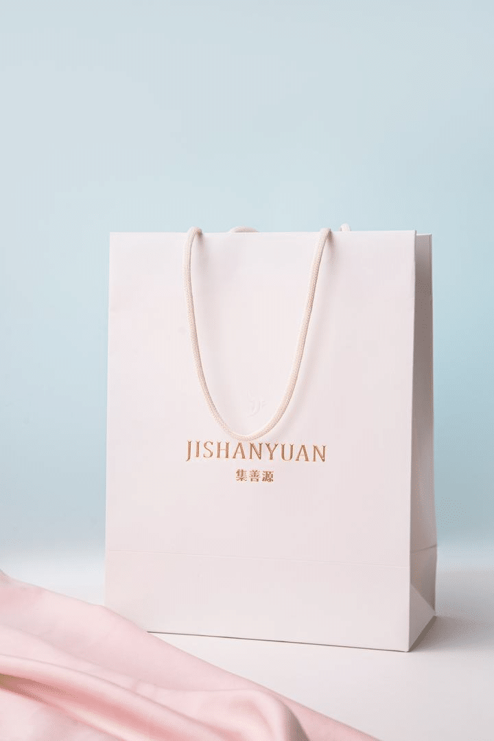 Pink shopping bag for beauty and cosmetics brand